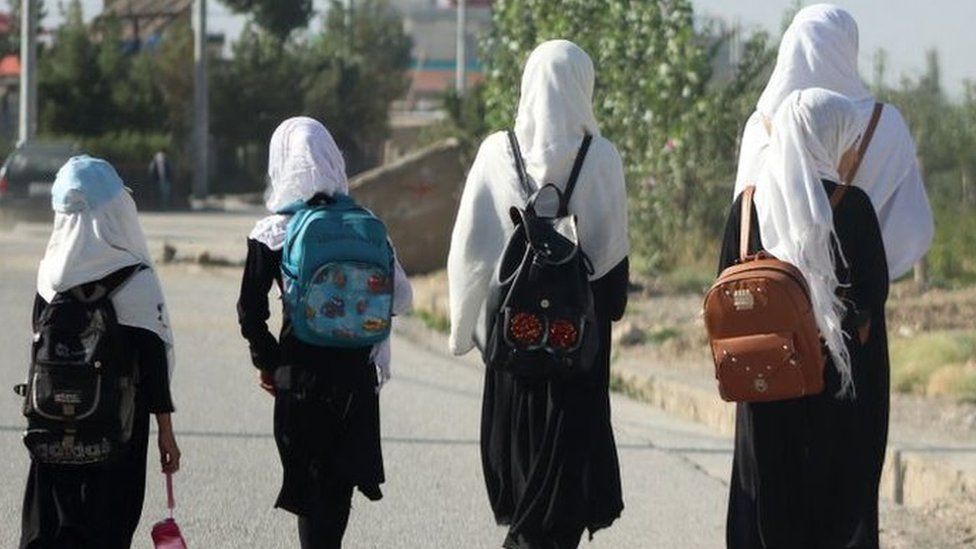 Girls walk to their school along a road in Gardez, Paktia porvince, on September 8, 2022.