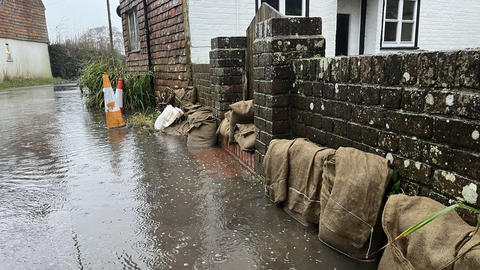 Property with sandbags in place on Station Road in Hellingly
