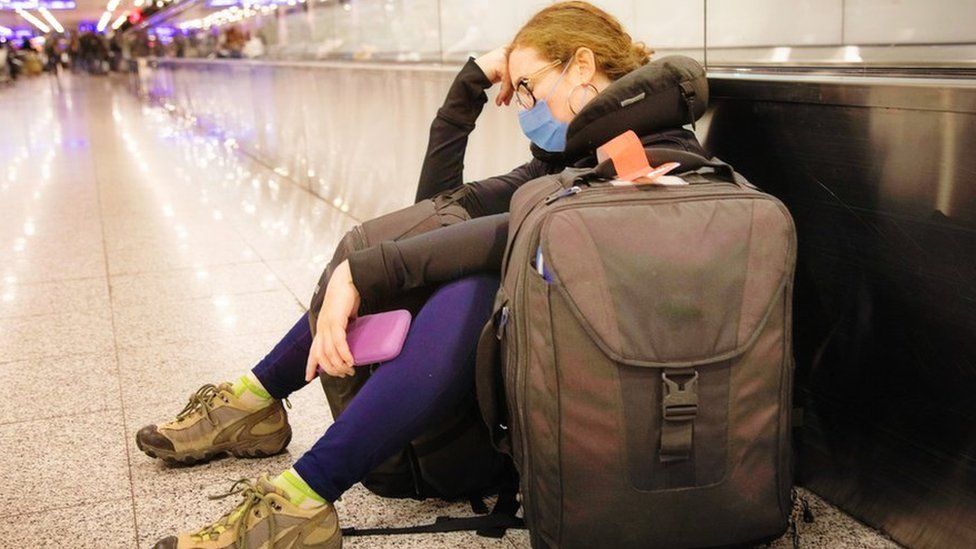 Woman waiting at airport (stock picture)