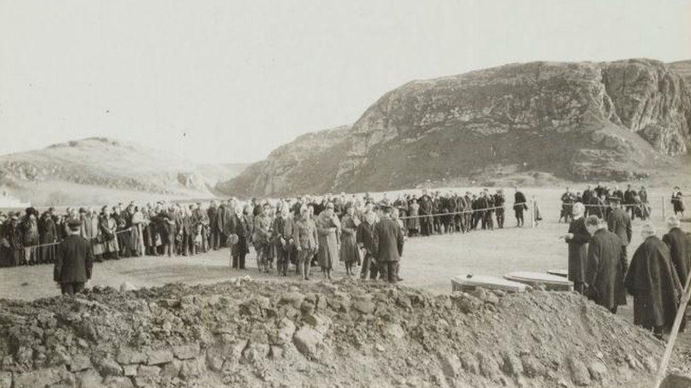 Funeral of 199 American soldiers, victims of the Otranto disaster, at Kilchoman, Islay, Scotland. Coffins seen in the foreground were made by local workmen. American army and Red Cross officers in foreground