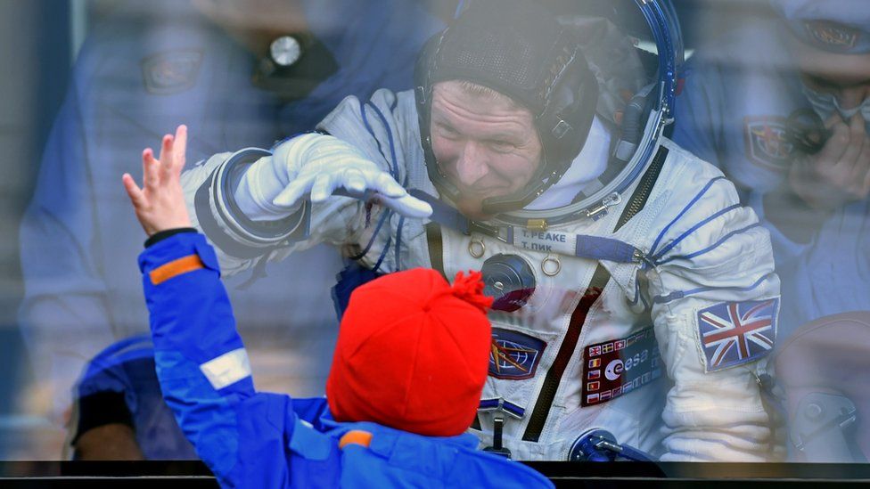 Tim Peake and his son