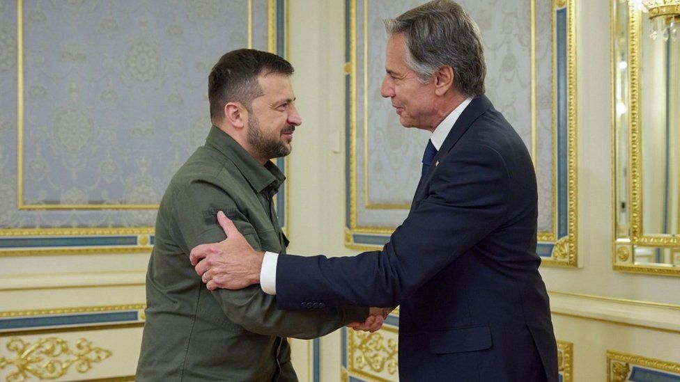 Ukraine's President Volodymyr Zelensky shakes hands with US Secretary of State Antony Blinken during their meeting in Kyiv