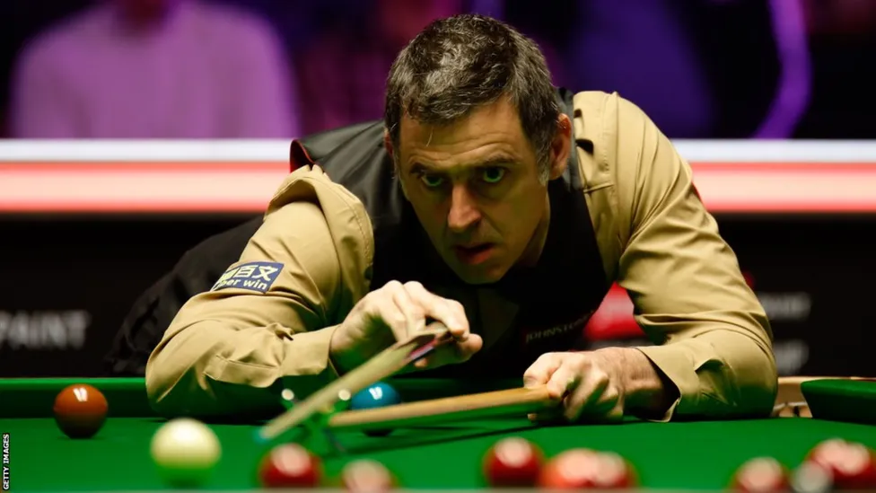 Snooker Showdown: Ronnie O'Sullivan Secures Third Final Spot with 10-7 Victory over Gary Wilson in Manchester.