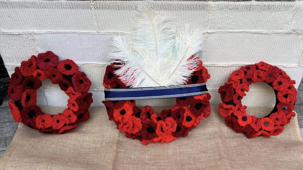 Knitted poppy wreaths