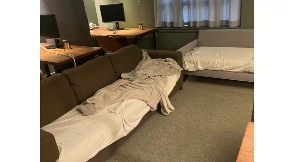Two sofas with bedding on them in Twitter's San Francisco office