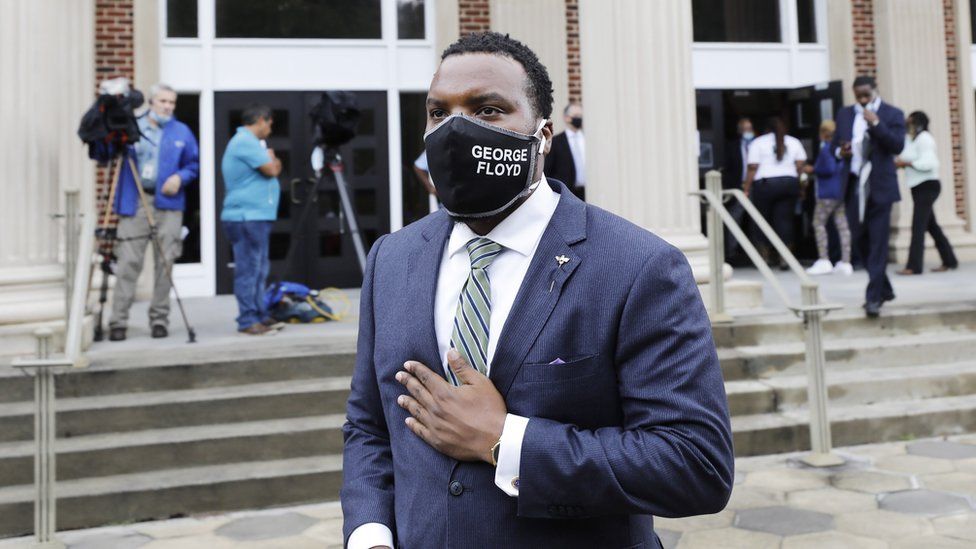 Arbery family lawyer S Lee Merritt in a face mask with George Floyd written on it
