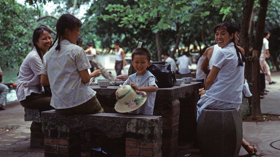 A family have tea in a park in Canton, Guangzhou, October 1978