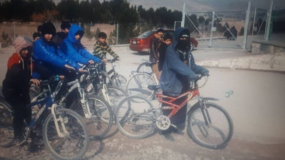 Sahba Barakzai, and a group of children out cycling
