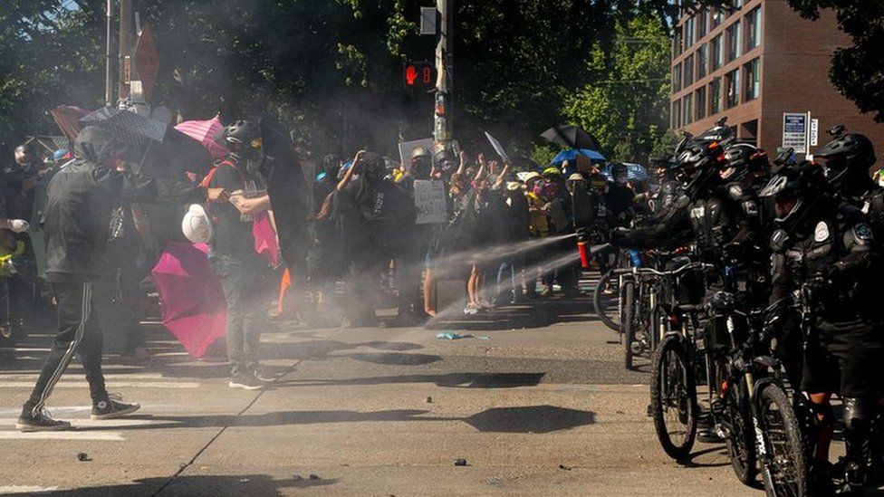 Police use pepper spray against protesters in Seattle