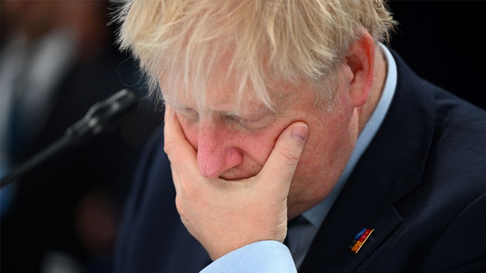 Boris Johnson gestures ahead of a meeting of The North Atlantic Council during the NATO summit at the Ifema congress centre in Madrid, on 30 June 2022
