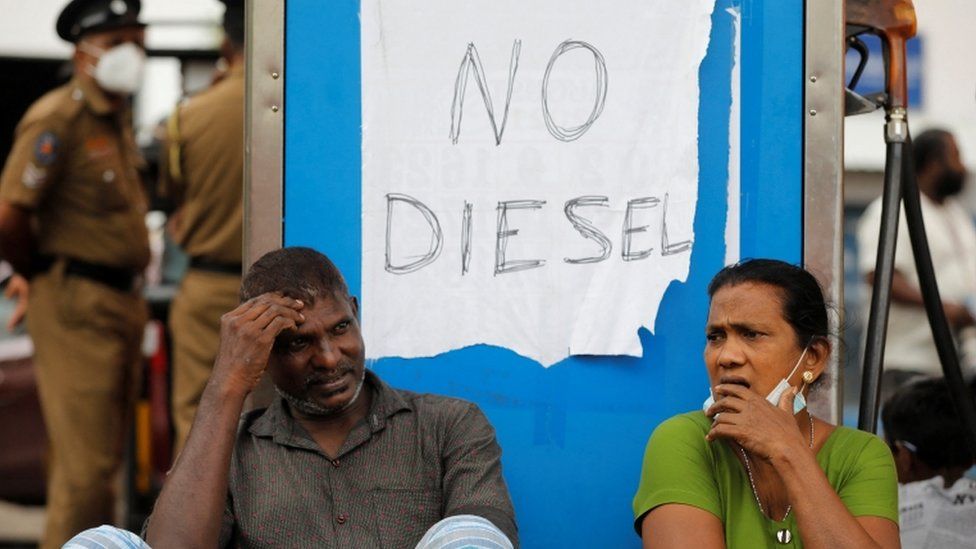 People queue at a fuel station in Colombo, amid the country's economic crisis.