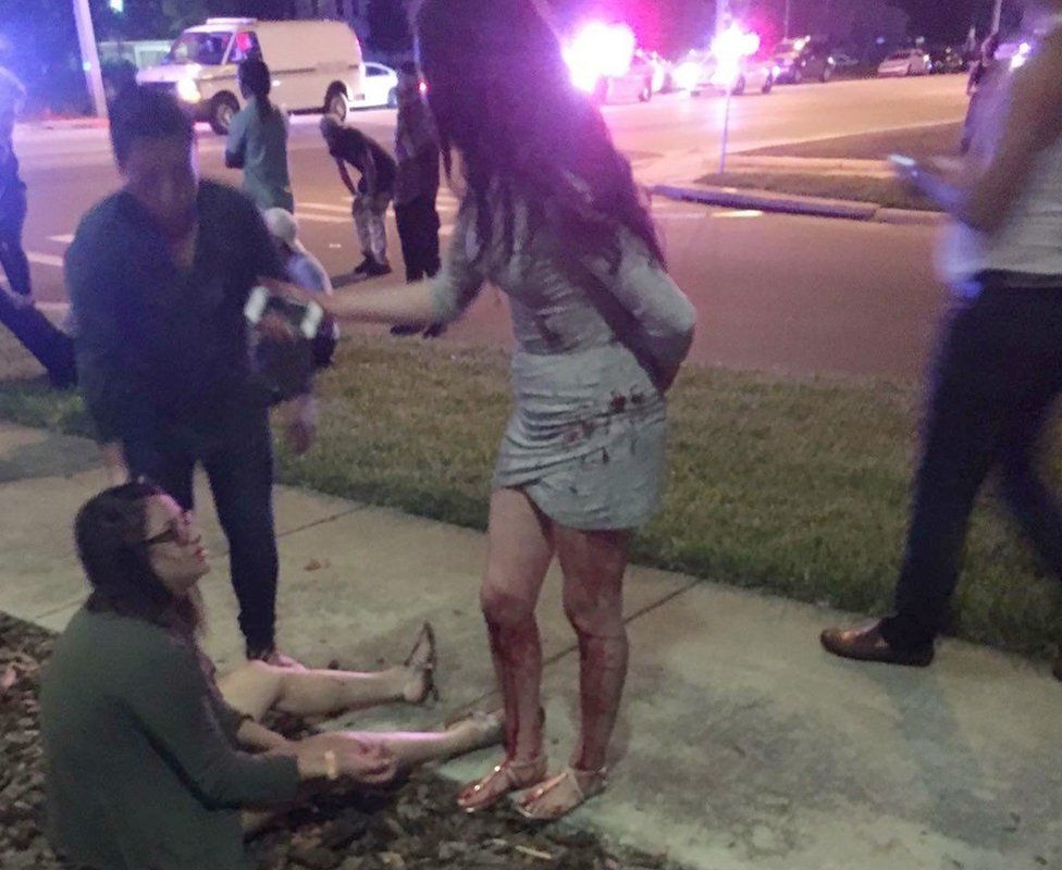 Two girls, covered in blood, outside the club in Orlando, Florida, on 12 June 2016