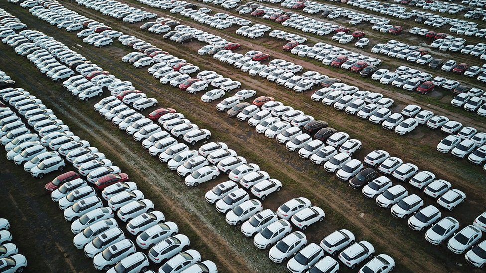 New cars lined up at a factory near the Chinese city of Shenyang