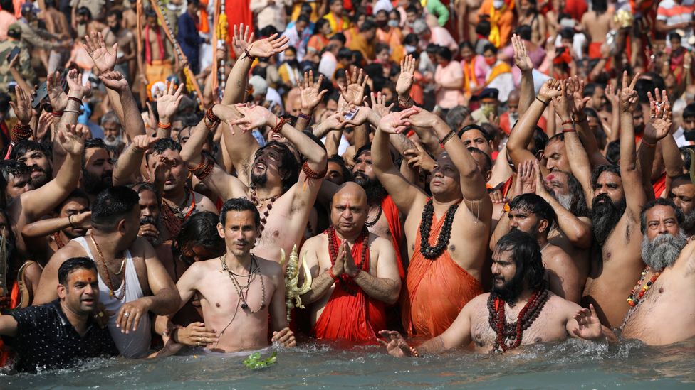 People in the Ganges river in Haridwar, India, 14 April 2021