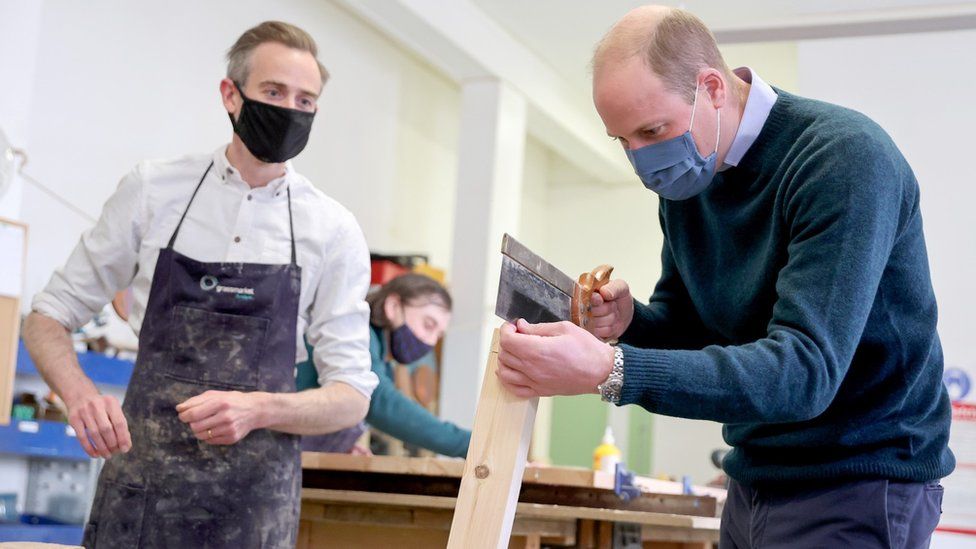 Prince William visits a workshop which makes furniture from recycled pews and other responsibly-resourced wood at the Grassmarket Community Project, a social enterprise set up by Greyfriars Kirk