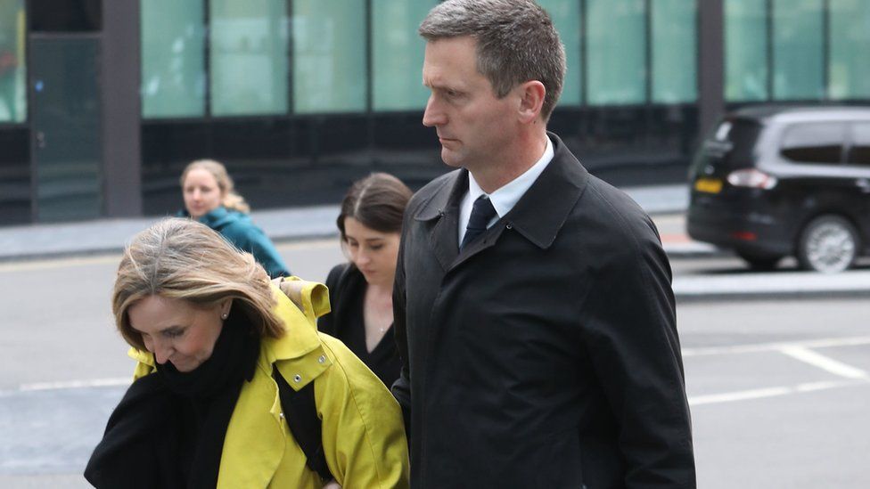Lord Holmes of Richmond leaves Southwark Crown Court, in London, where he is due to stand trial for sexual assault.