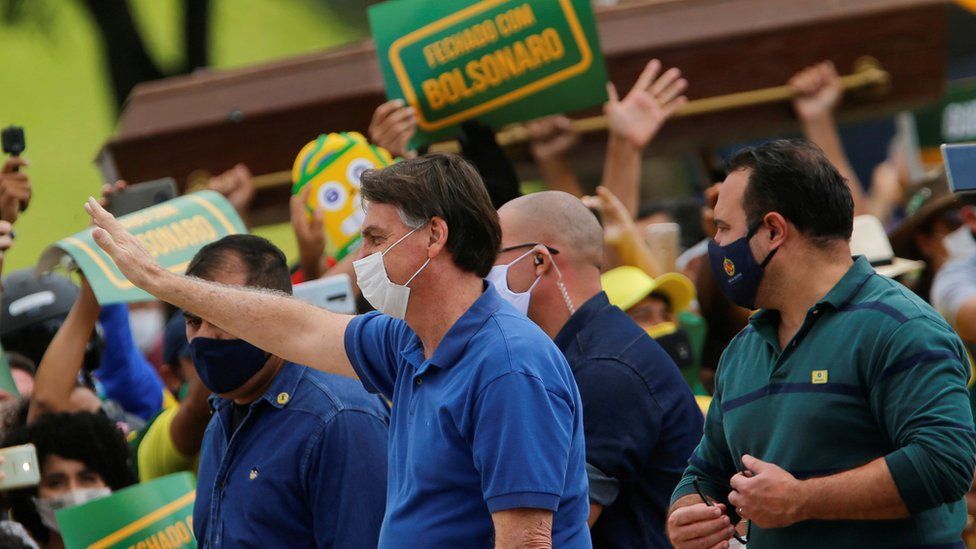 President of Brazil at rally with supporter