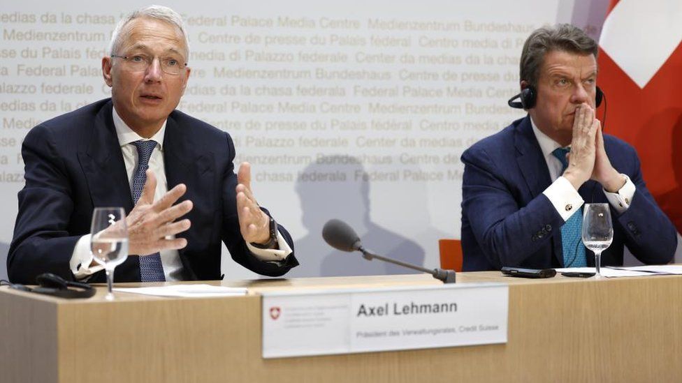 Axel Lehmann (L), Chairman Credit Suisse, speaks next to Colm Kelleher (R), Chairman UBS, during a press conference in Bern, Switzerland