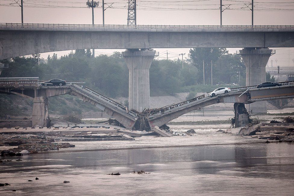 A view on a damaged bridge following strong rains and floods in Fengtai district, west of Beijing, China, 03 August 2023. Beijing recorded its heaviest rainfall in 140 years brought by Typhoon Dosksuri causing floods, evacuation of thousands of people and 21 deaths.