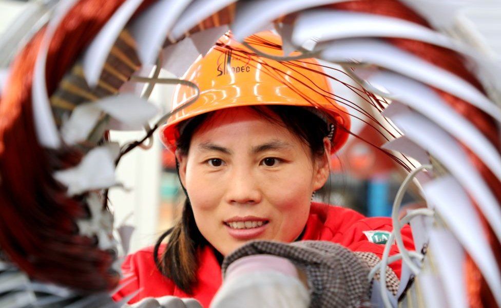 An employee works at a permanent magnet motor workshop of Shengli Oilfield Shuntian Energy Saving Technology Co., Ltd. on March 6, 2024 in Dongying, Shandong Province of China.