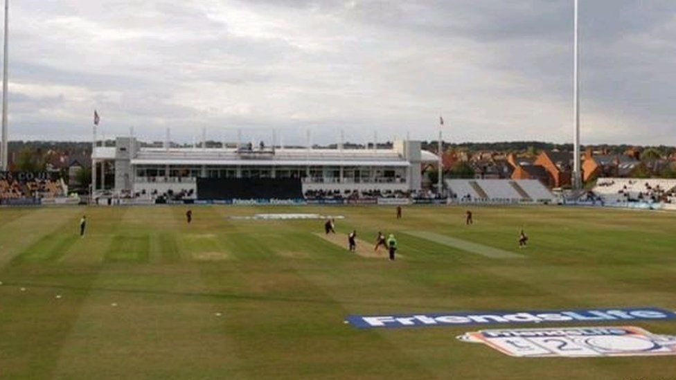 Cricket ground with spectator stand