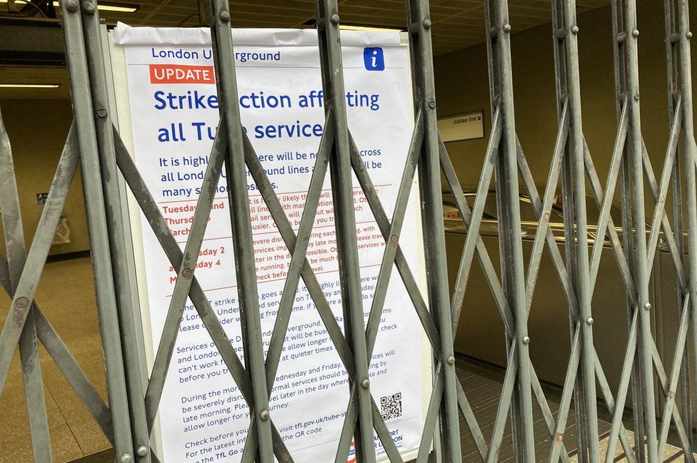 Sign showing strike action affecting services