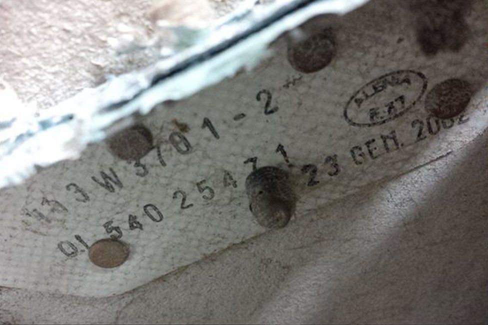 Picture shows part number and date stamp that helped investigators trace origins of the piece