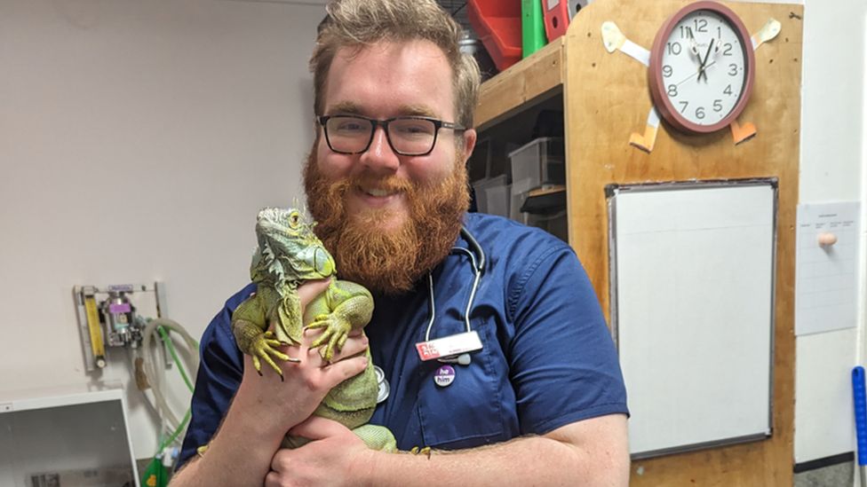 Dr Matt Guy holding a reptile