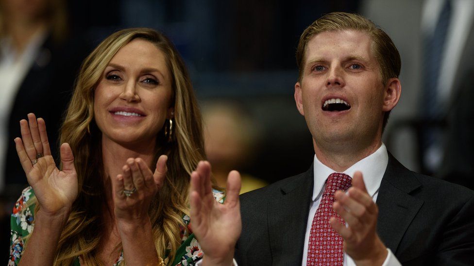 Eric Trump and his wife Lara Yunaska applaud as U.S. President Donald Trump addresses a rally at the Covelli Centre on July 25, 2017 in Youngstown, Ohio