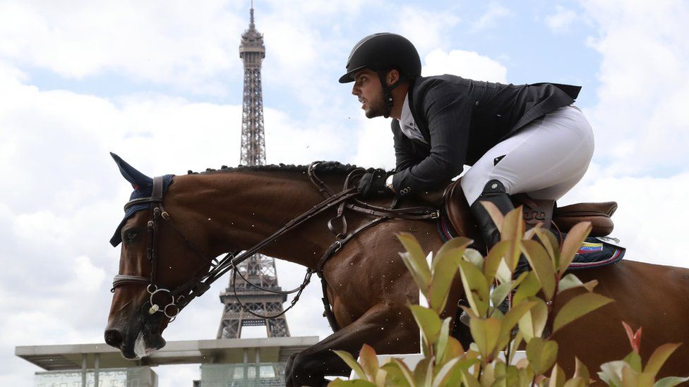 Venezuela's Emanuel Andrade riding Reus de la Nutria competes during the Paris Eiffel Jumping event on July 2, 2017 in Paris.