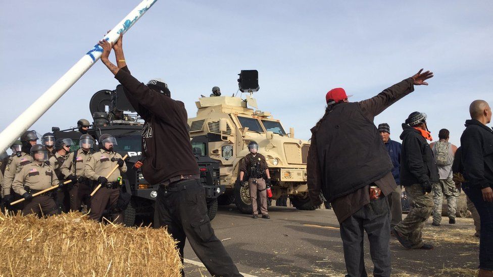 Dakota Access pipeline protesters confront law enforcement on Thursday, Oct. 27, 2016, near Cannon Ball, N.D