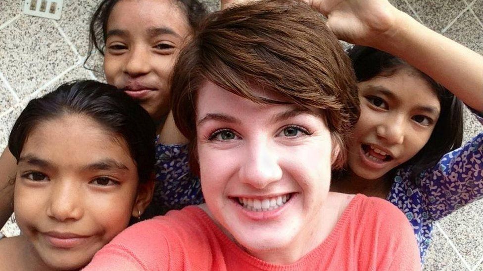 Hailey and some children she was working with in Nepal