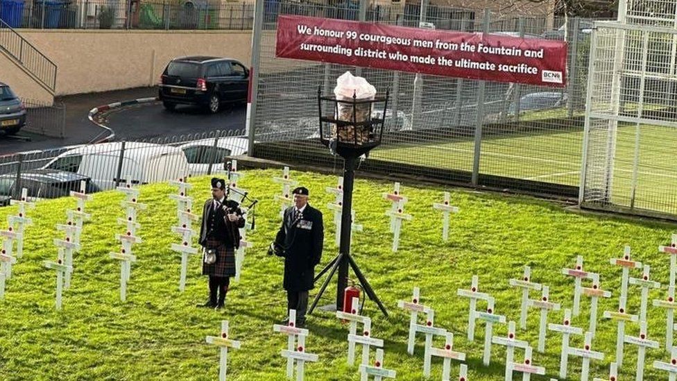 Remembrance service in Derry with 100 white crosses
