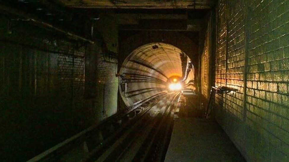 Kolkata Metro rake runs through a tunnel under the Hooghly river, in Kolkata, April 12, 2023.