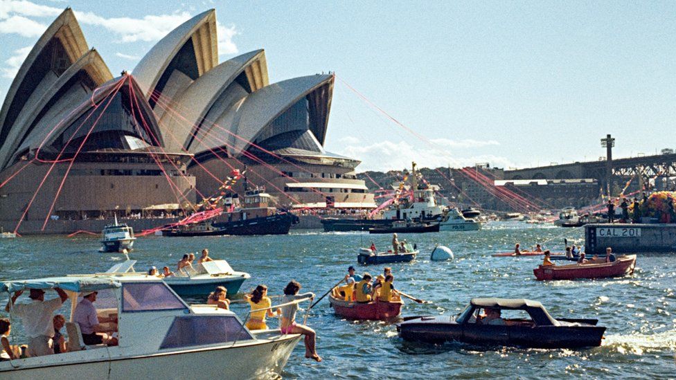 People gather in Sydney harbour to watch the 1973 opening ceremony