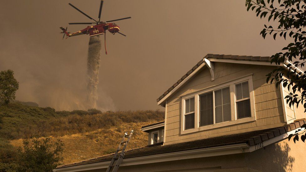 Helicopter dumps water near Santa Clarita, California