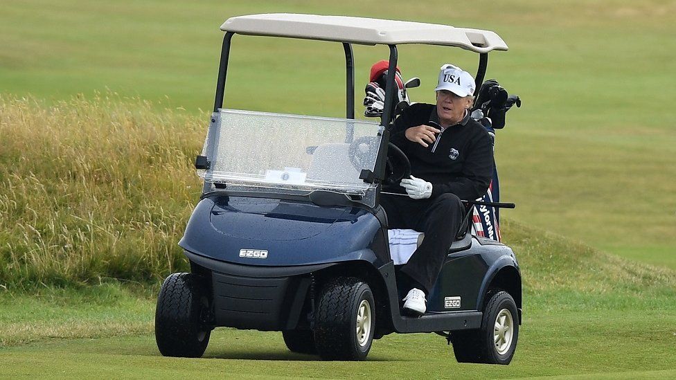 Donald Trump in golf bugy