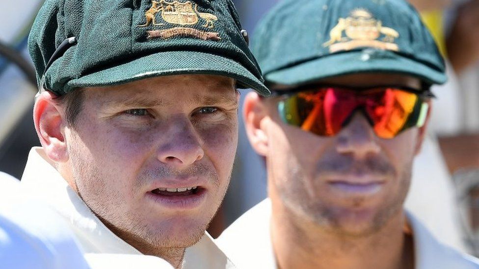 Steve Smith and David Warner wearing the baggy green caps of Australia's Test team