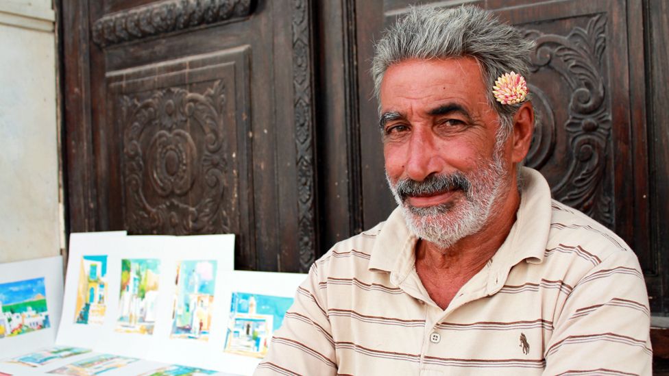 Mohamed El-Hed selling art works in Tunis. Photo: Rana Jawad, BBC Africa
