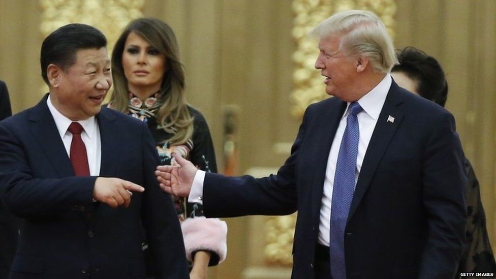 S. President Donald Trump and China"s President Xi Jinping arrive at a state dinner at the Great Hall of the People on November 9, 2017 in Beijing, China.