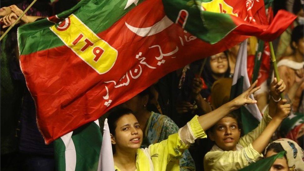 Supporters of Pakistan Tehreek-e-Insaf (PTI) political party during a rally after former Prime Minister Imran Khan, lost the vote of no-confidence in the parliament, in Karachi, Pakistan, 10 April 2022.