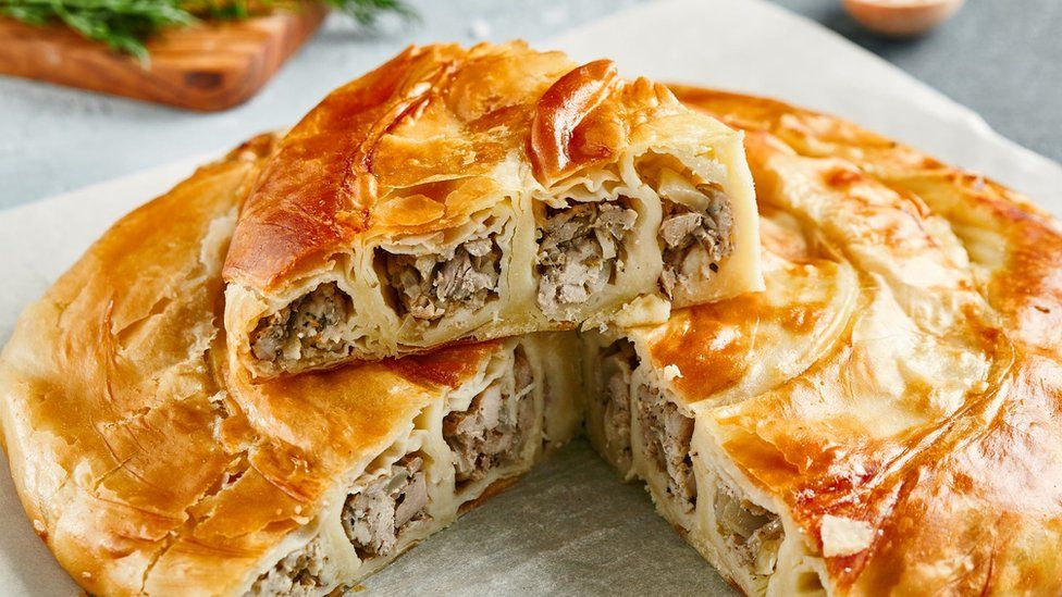 A tantalising slice of a golden-brown burek - a Balkan cross between a pie and pasty