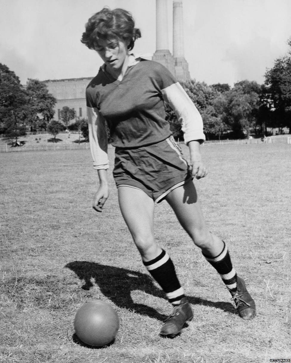 Joan Briggs, England centre forward, training at Battersea Park, London, in July 1959