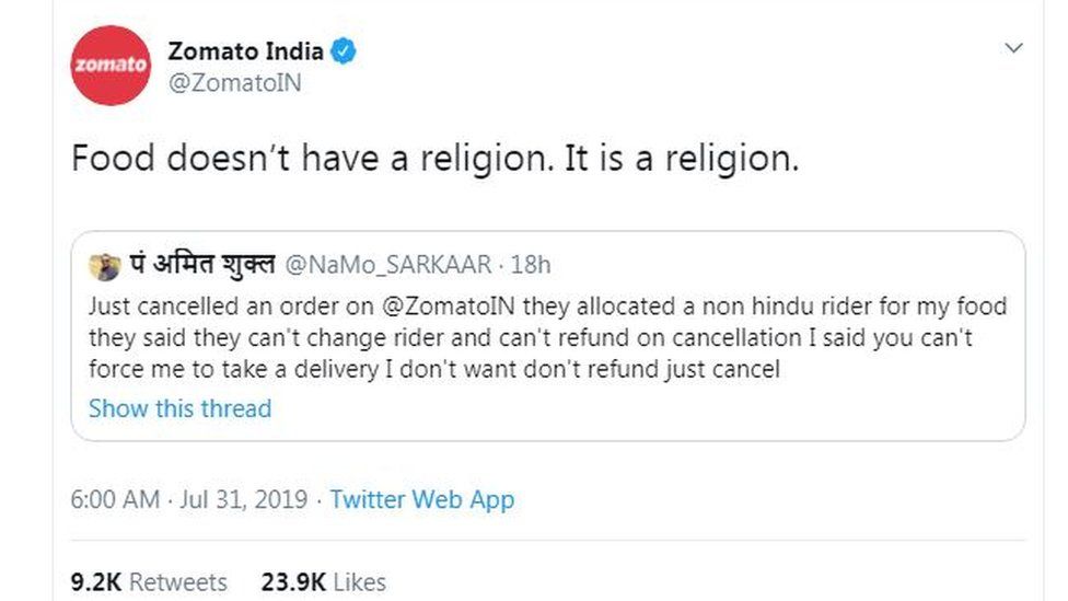 Tweet by @ZomatoIn stating: "Food doesn't have a religion. It is a religion". It is quote tweeting a tweet by @NaMo_SARKAAR which states: "Just cancelled an order on @ZomatoIN they allocated a non hindu rider for my food they said they can't change rider and can't refund on cancellation I said you can't force me to take a delivery I don't want don't refund just cancel