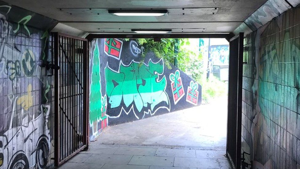 Subway exit, showing graffiti on walls