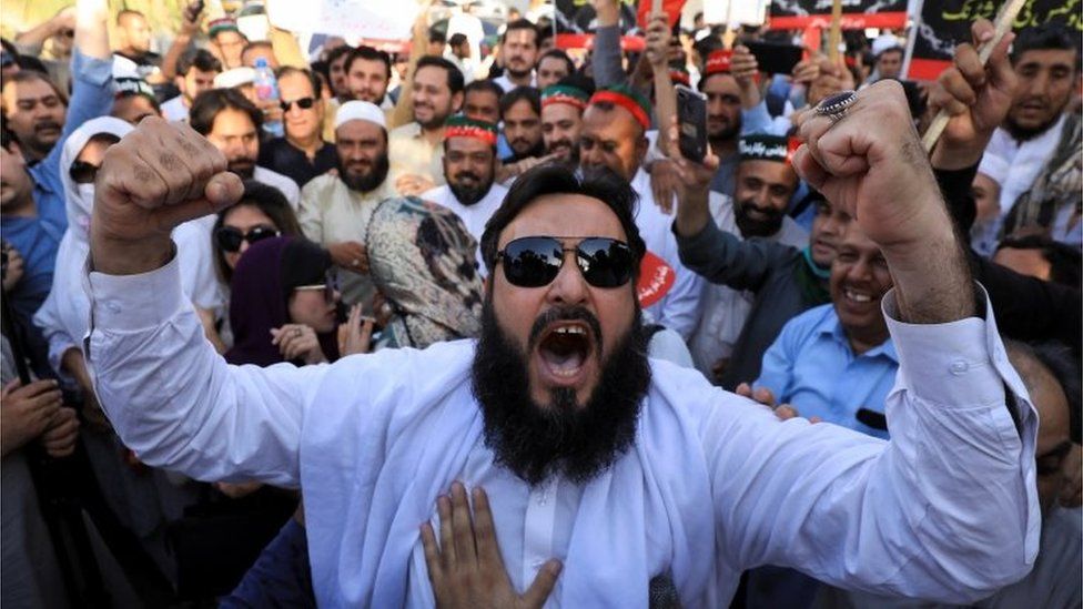 A supporter of the Pakistan Tehreek-e-Insaf (PTI) political party chants slogans with others during a country-wide protest, called by the ousted Prime Minister Imran Khan, against the fuel price hike in Peshawar, Pakistan June 3, 2022.