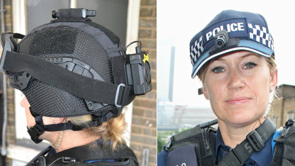 Armed police officer wearing head camera
