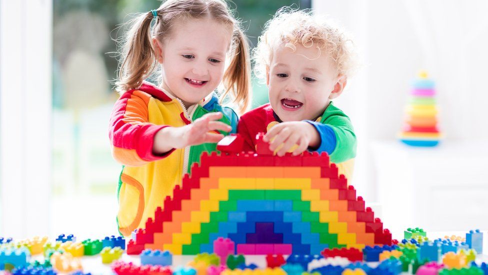 Children playing with Lego