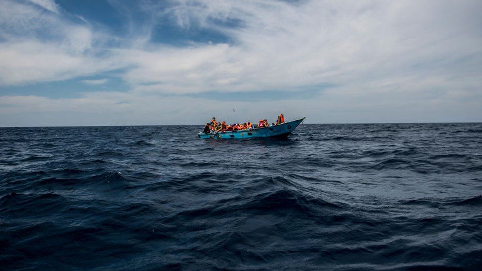 Migrants on a ship in the Mediterranean Sea.