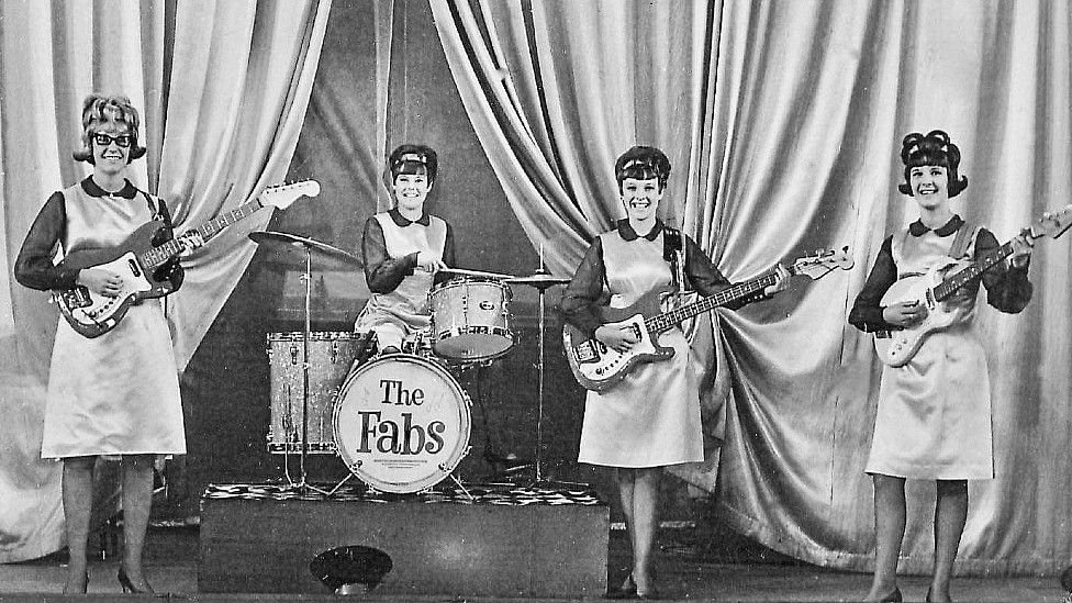 The Fabs in a black and white photograph
